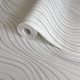Tört fehér-ezüst színű hullámmintás Grandeco vlies-hab tapéta 2026